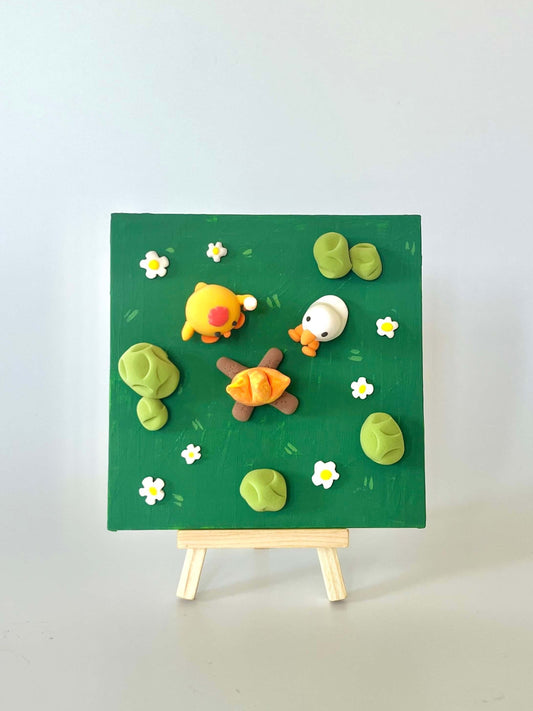Small green board with decorative items on a white background