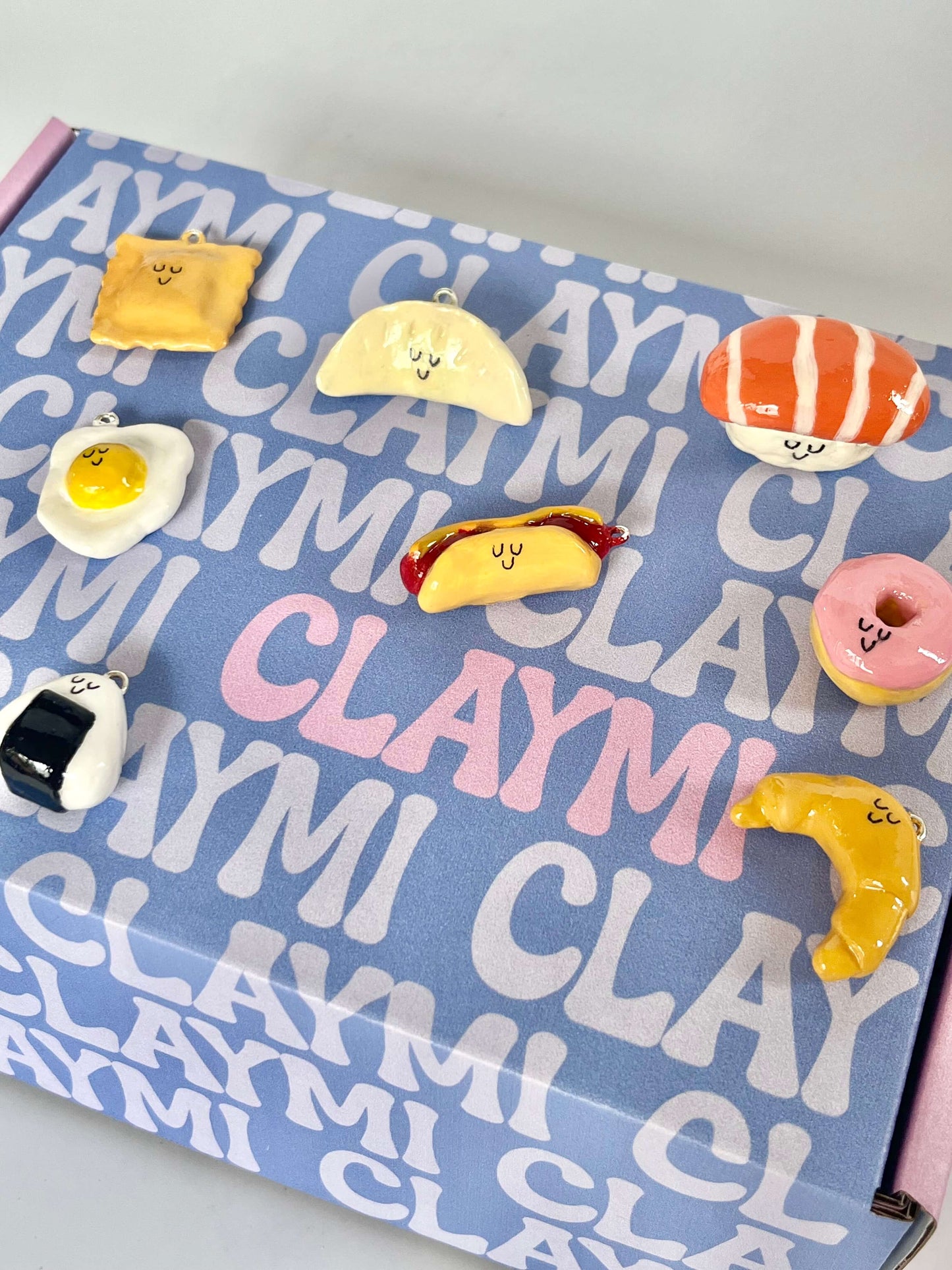 Adorable handmade clay charms created using the DIY air-dry clay kit—perfect for personalizing keychains, decorating phone straps, or gifting as custom keepsakes