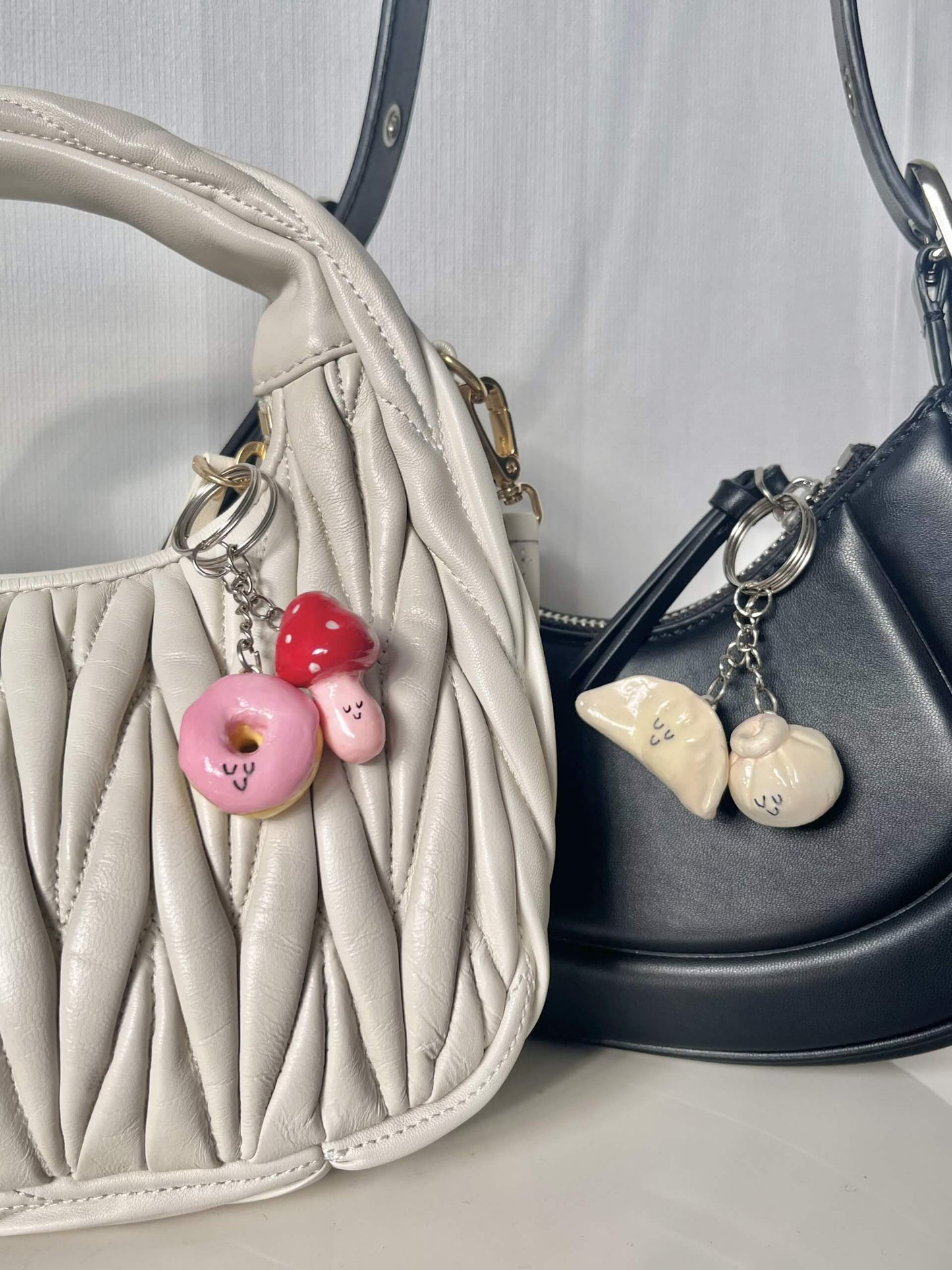 A collection of colorful clay keychain charms made using a DIY air dry clay kit, attached to the strap of a neutral canvas tote bag. Each charm reflects unique, handmade creativity — from tiny food shapes to kawaii characters — highlighting the joy of crafting as a fun, therapeutic hobby for kids, teens, and adults. Perfect for customizing everyday accessories with personality.